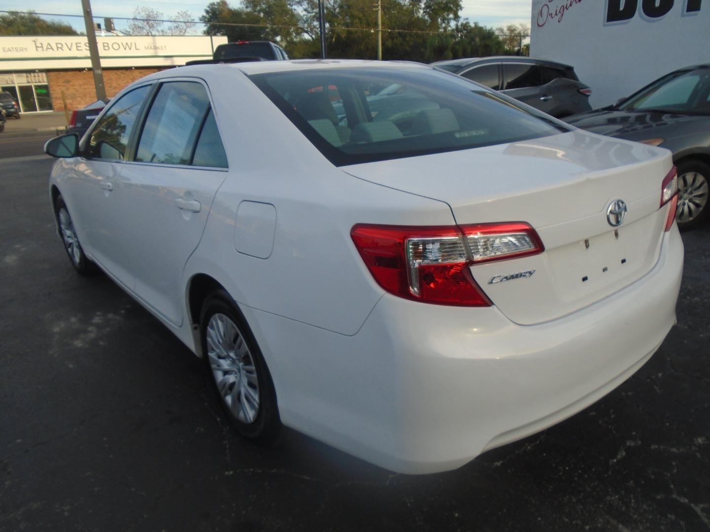 2014 Toyota Camry (4T1BF1FK0EU) , located at 6112 N Florida Avenue, Tampa, FL, 33604, (888) 521-5131, 27.954929, -82.459534 - Photo#4